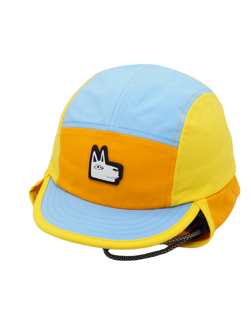 Color-blocked baby hat with a small logo on a white background